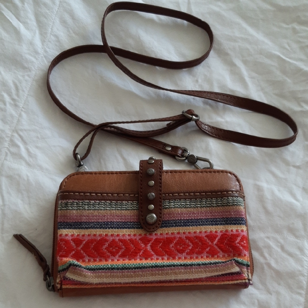 The Sak Brown and Red Crossbody Bag with Bohemian Flair